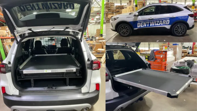 White Dent Wizard SUV with rear cargo platform system extended, showing organized equipment storage designed for field service and mobile work.