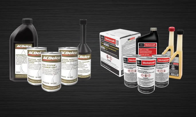 Product lineup of ACDelco and Motorcraft automotive maintenance chemicals displayed against a dark background. The image includes fuel system cleaners, intake and valve cleaners, brake fluid, coolant, and diesel fuel conditioner containers.