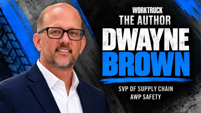 Dwayne Brown, SVP of Supply Chain at AWP Safety, wearing glasses, a navy suit jacket, and white shirt.