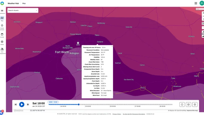 DTN Weather Hub map centered on Fort Worth, Texas, displaying localized winter weather conditions and a data panel with freezing rain, pavement temperature, visibility, wind, and crash risk information.