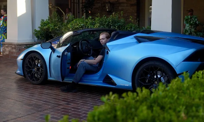 The author exits a Lamborghini