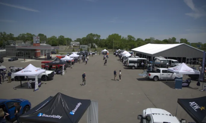 Overview of outdoor vendor tents at Stellantis event