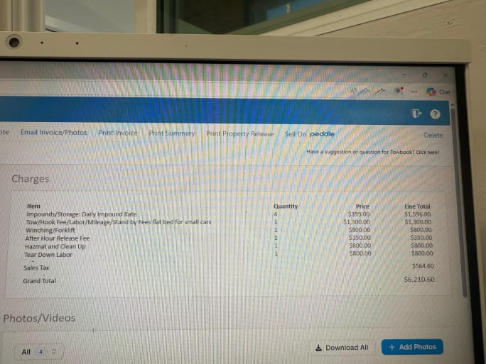 A computer screen showing an itemized towing bill.