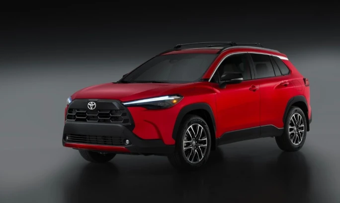 2026 Toyota Corolla Cross gas-powered model in red.