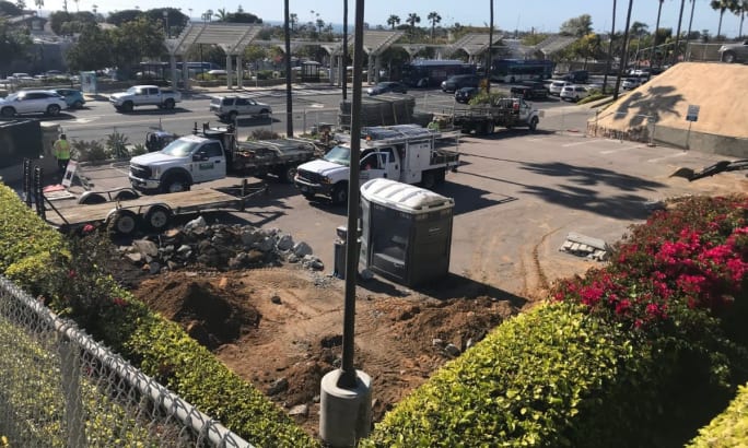 An overview of an EV depot parking lot under construction in Encinitas, California.