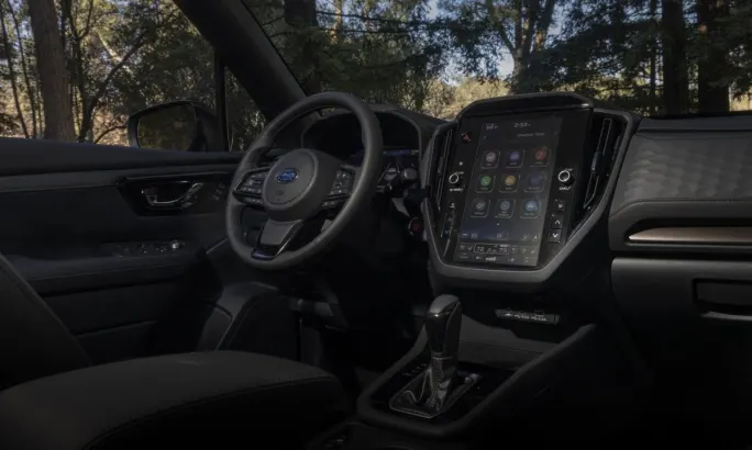 2025 Subaru Forester Hybrid front-cabin interior featuring the front dashboard and driver seat.