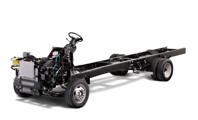 A Ford F-59 stripped chassis on a white background.