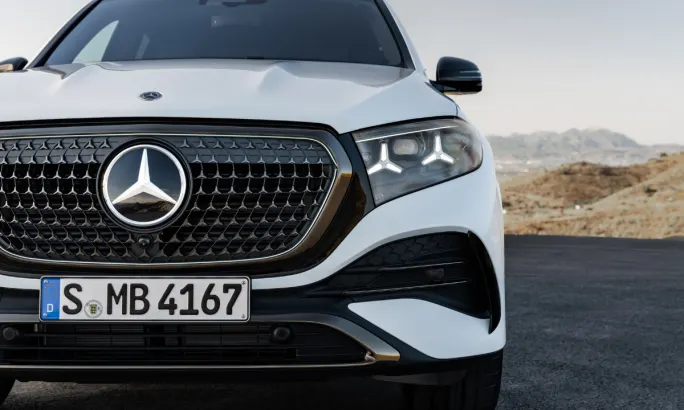 Front view of Mercedes-Benz GLE grille and LED headlights, highlighting updated styling and emblem detail.