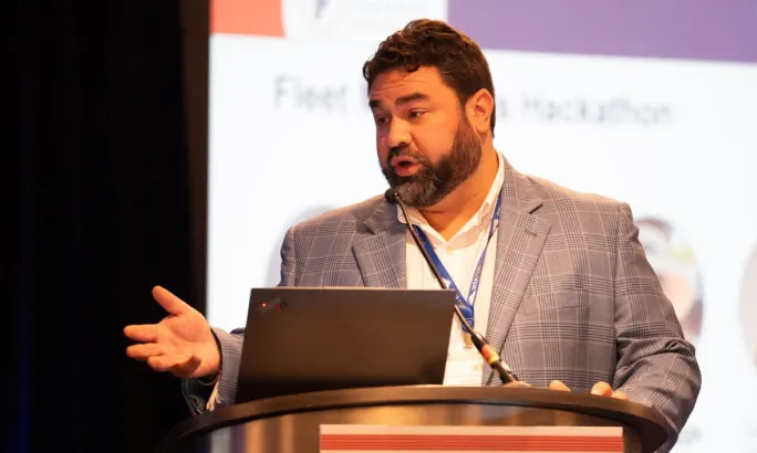 Marc Canton addresses the crowd from the podium at the recent Fleet Forward Conference.