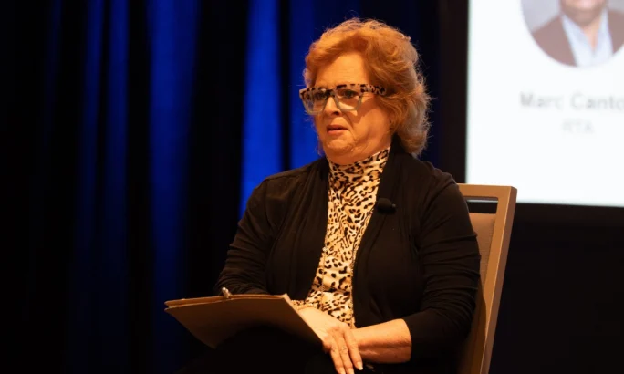 Lisa Kneggs speaking on stage during a seminar at the recent Fleet Forward Conference.
