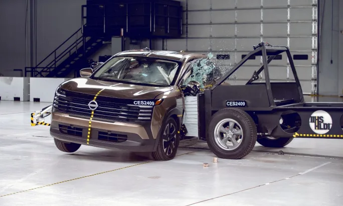 A bronze 2025 Nissan Kicks during the updated side crash test.