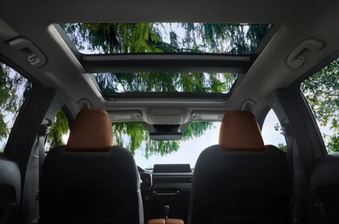 Interior angle of a sunroof in a Mazda SUV.