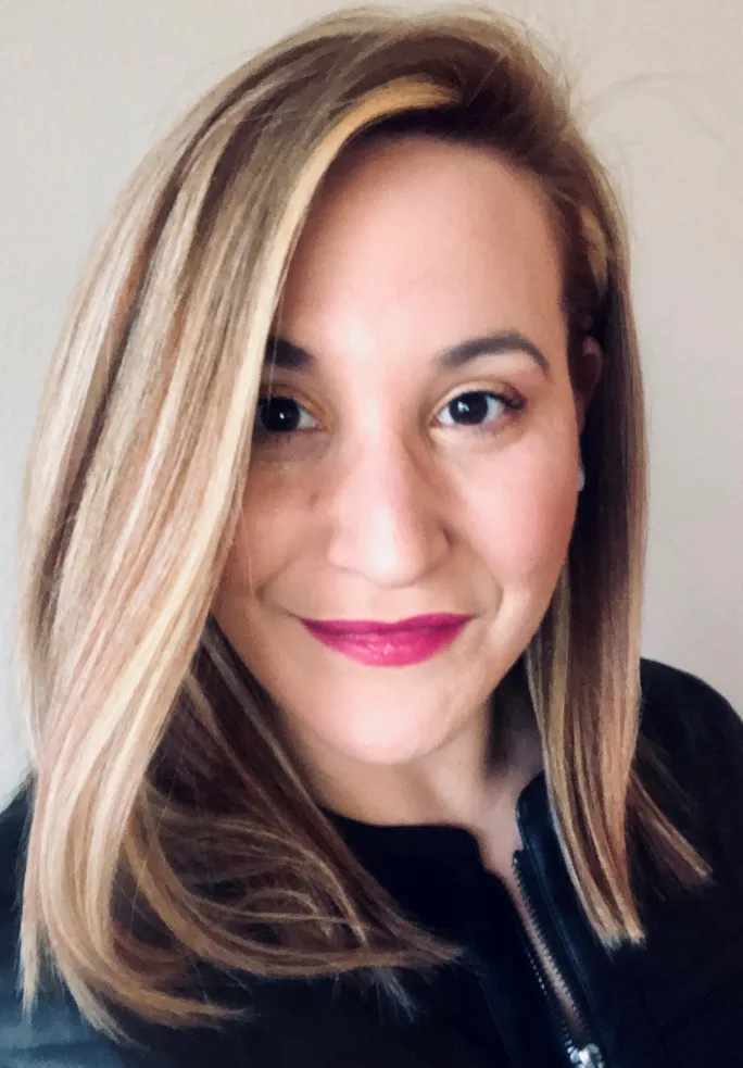 Headshot of Karyna Zarate.