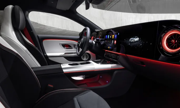 Red and black interior of a 2026 Mercedes CLA sedan.