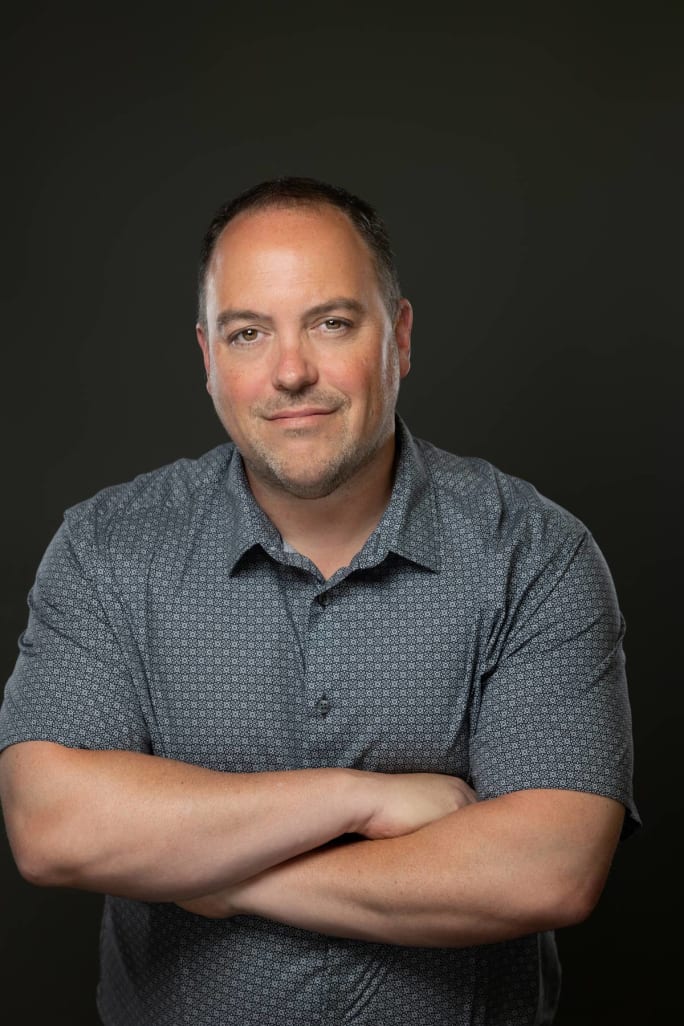 Nick DiPrima poses with arms folded.