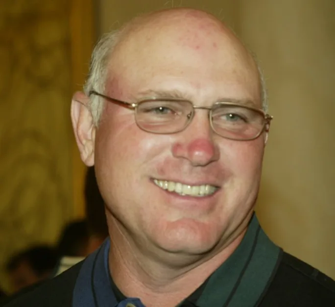 Up close portrait of Bill Gibson smiling.