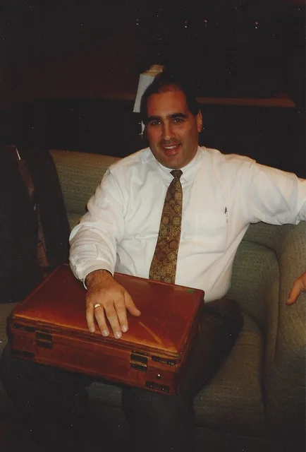 Old scanned image of a younger Matthew Betz in professional attire.