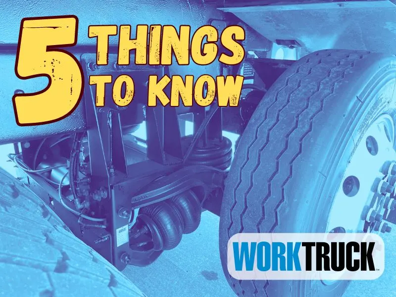 Blue-tinted image of a close-up photo of a truck tire and suspension for a lift axle. Top left has 5 Things to Know in large yellow type.