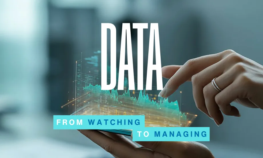 A hand interacts with a digital data display above a smartphone, symbolizing how fleets use real-time insights to manage trucks, drivers, and daily operations.