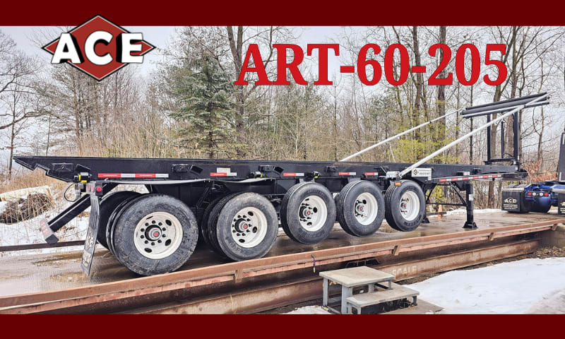 Photo of trailer with two regular axles and five lifted axles parked on a scale.