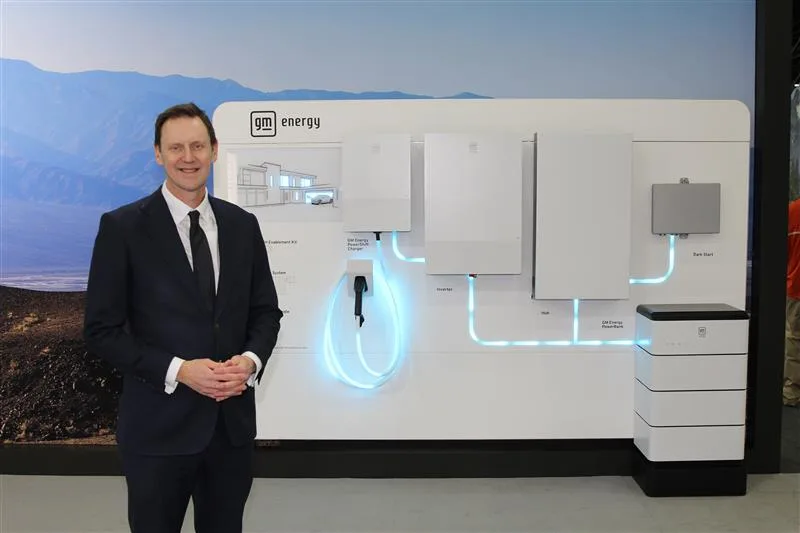 Duncan Alrdred in front of a display of GM Energy products