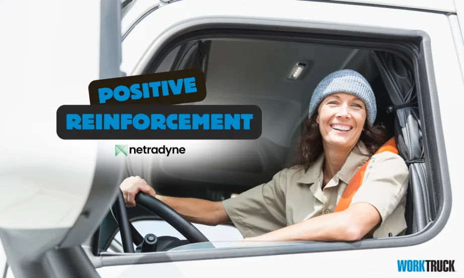 Smiling truck driver in cab, highlighting Netradyne’s DriverStar program promoting safety through positive reinforcement and real-time driver recognition.
