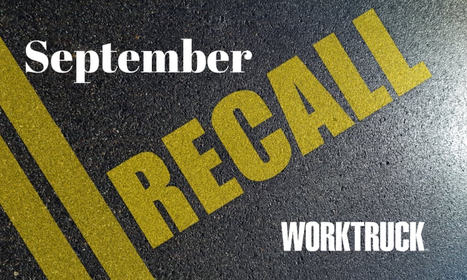 Pavement background with double yellow lines and large text that says Recall, September, and Work Truck logo.