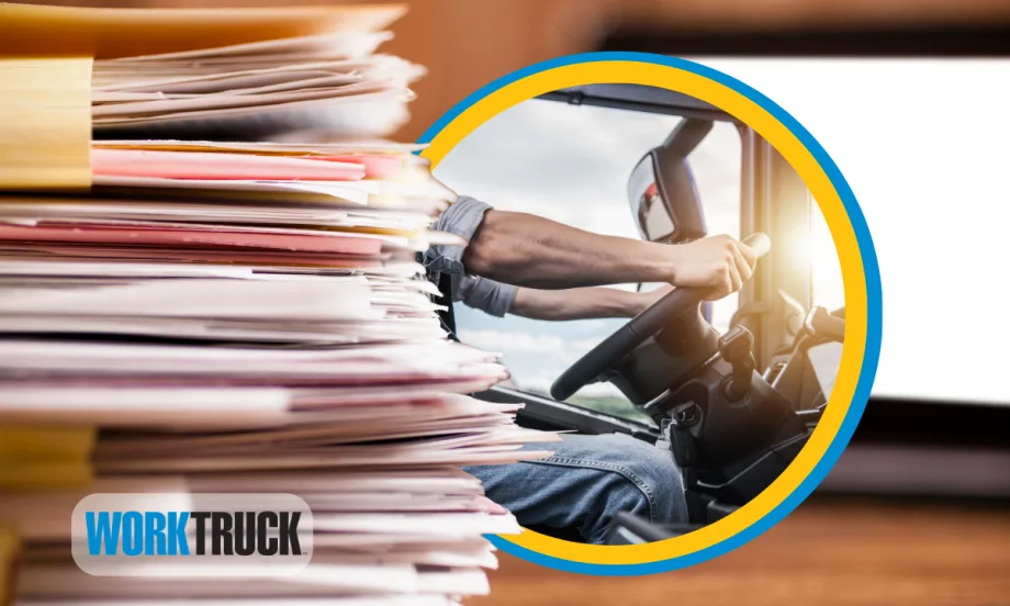 Stack of files and folders with a computer screen in the background and an inset oval photo of truck driver grasping a steering wheel.