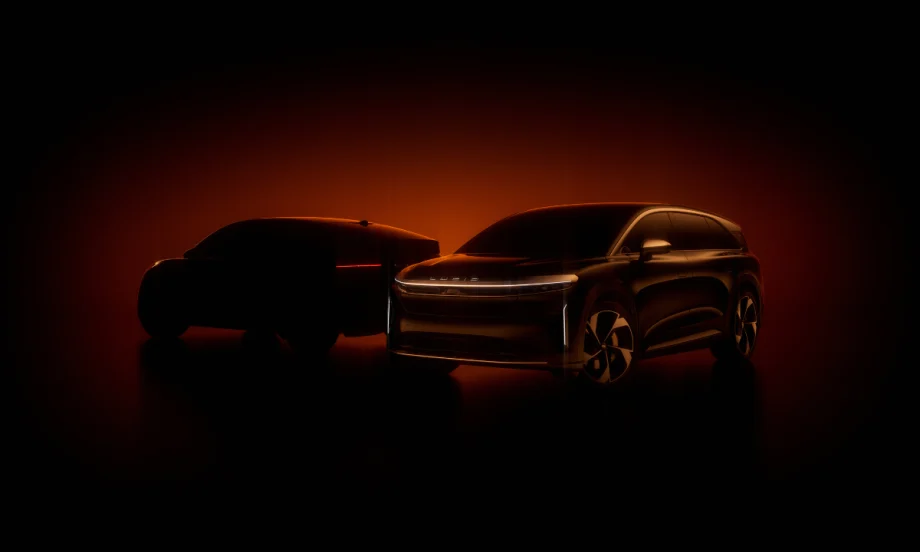Two Lucid electric vehicles silhouetted in orange light, symbolizing the company’s partnership with NVIDIA to advance autonomous driving technology.