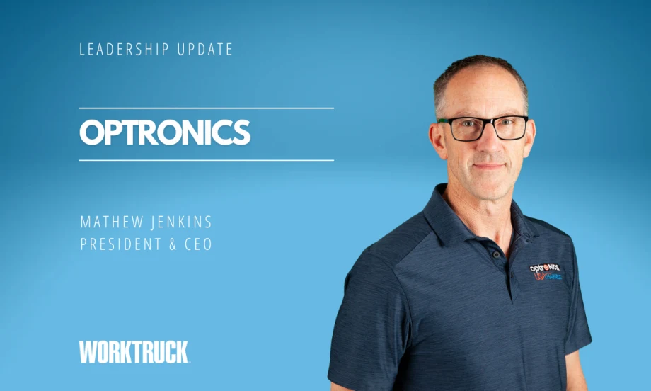 Blue background with headline for Leadership Update and Optronics with inset photo of a man in a short sleeve shirt.