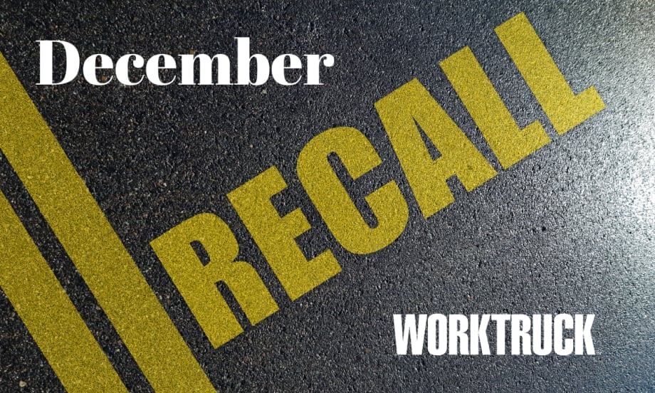 Pavement background with double yellow lines and large text that says Recall, December, and Work Truck logo.
