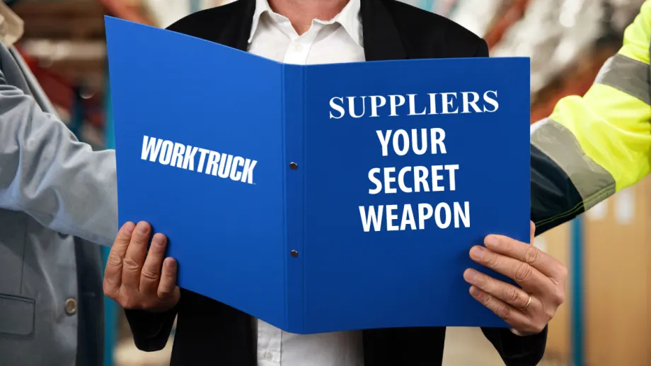Person holding blue Work Truck folder labeled “Suppliers Your Secret Weapon,” highlighting the importance of vendor partnerships in fleet disaster preparedness