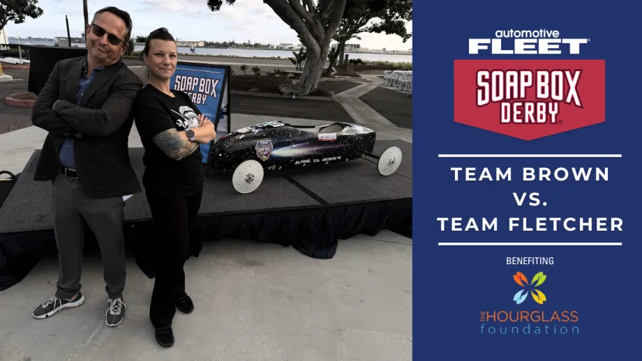 Chris Brown and Lauren Fletcher pose with a soap box derby car ahead of the 2026 Corporate Soap Box Derby Challenge, a fundraising race supporting STEM and skilled trades education.