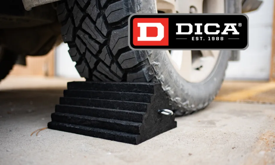 Image of a truck tire parked against a rubber wheel chock and a logo for DICA.