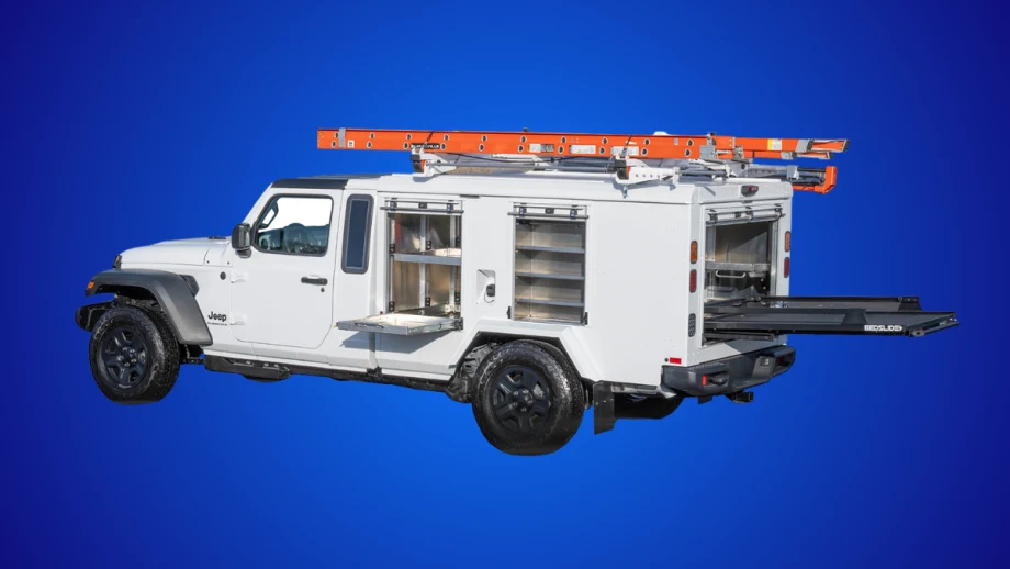 Morgan Olson Kestrel Class 2 work truck built on a Jeep Gladiator platform with utility body compartments, ladder rack, and slide-out cargo system designed for off-road jobsite use.