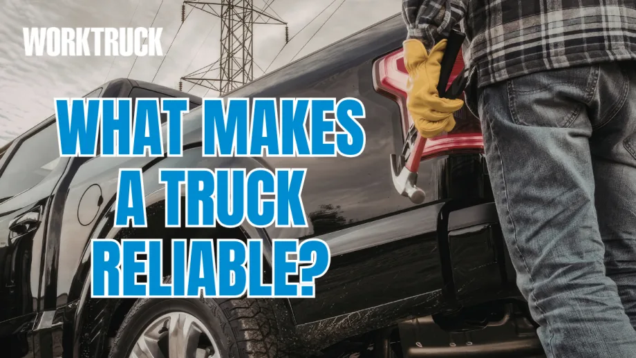 Technician standing beside a work truck holding a hammer, with text “What makes a truck reliable?” overlaid