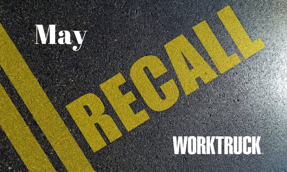 Pavement background with double yellow lines and large text that says Recall, May, and Work Truck logo.