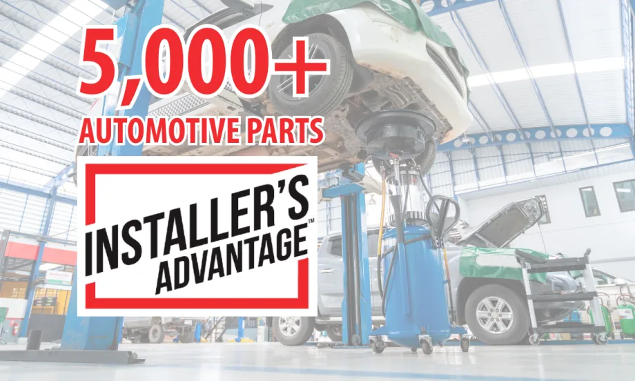 Promotional graphic for Installer’s Advantage featuring “5,000+ Automotive Parts” text over an auto repair shop scene with vehicles on lifts, service equipment, and technicians’ work bays in the background.