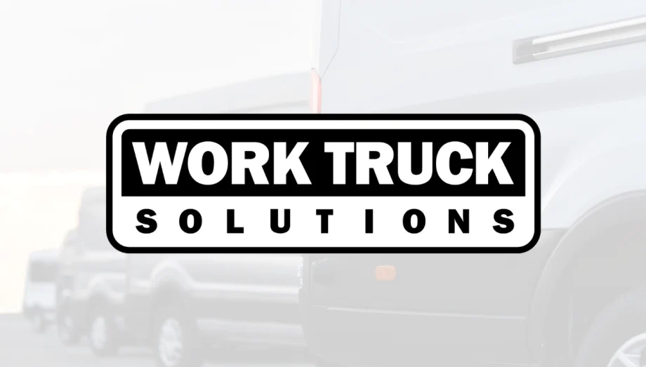 Work Truck Solutions logo centered over a faded background featuring commercial work trucks.