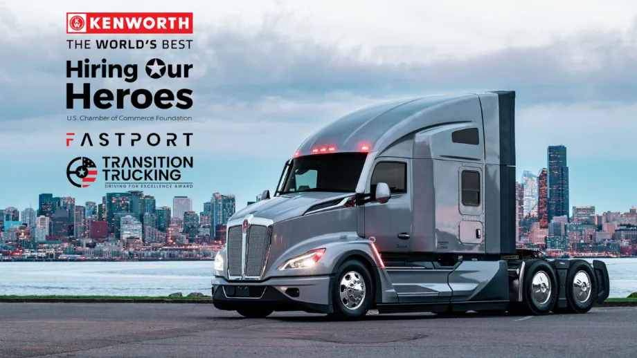 Kenworth T680 semi-truck posed before a city skyline, alongside logos for Kenworth, Hiring Our Heroes, Fastport, and Transition Trucking’s Driving for Excellence Award.