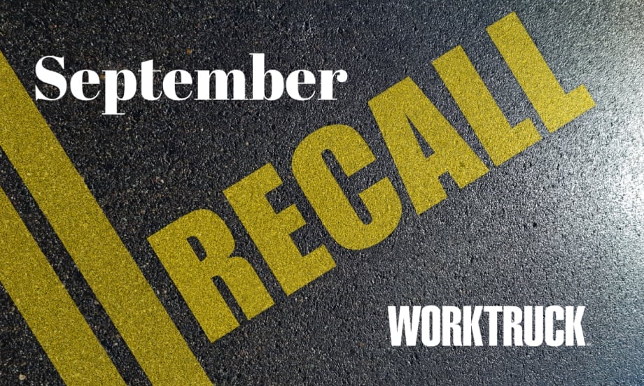 Pavement background with double yellow lines and large text that says Recall, September, and Work Truck logo.