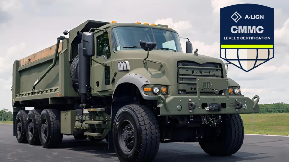 Mack Defense heavy-duty military dump truck displayed with an A-LIGN CMMC Level 2 Certification badge, highlighting the company’s cybersecurity certification.
