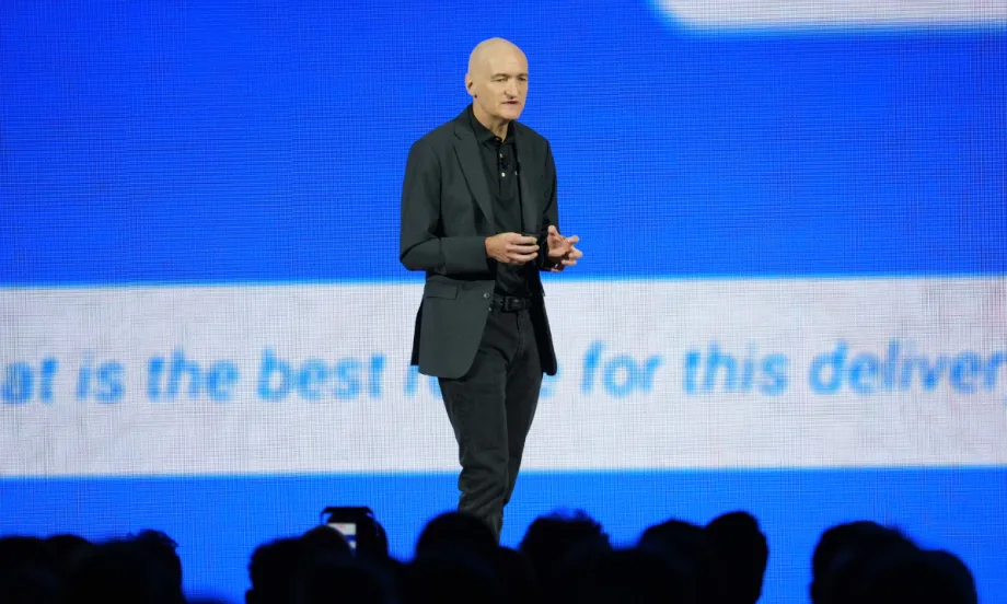 Geotab founder Neil Cawse on stage.