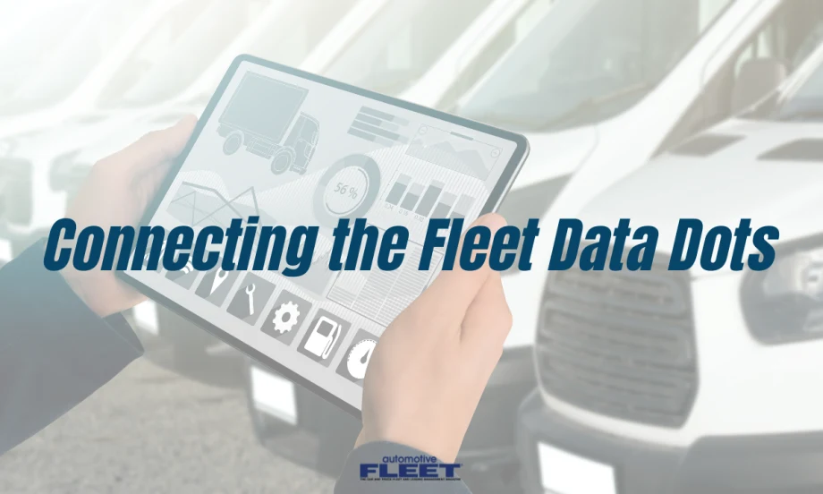 A fleet technical holding an ipad with a maintenance dashboard