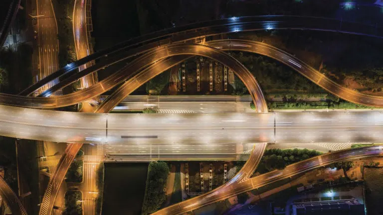 An overhead image of a freeway system with no vehicles