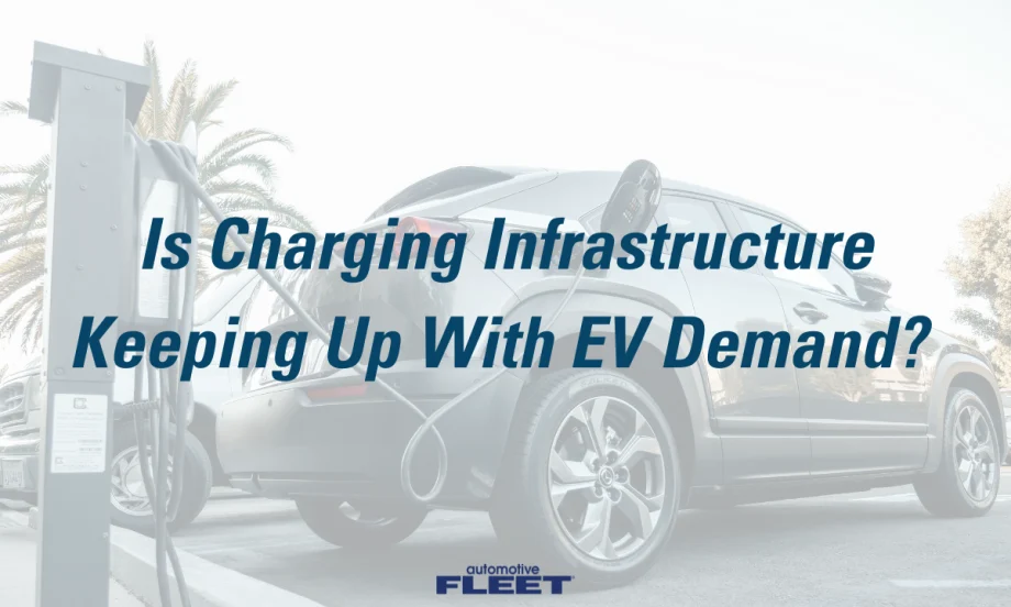 A rear view of a Tesla getting charged at a depot