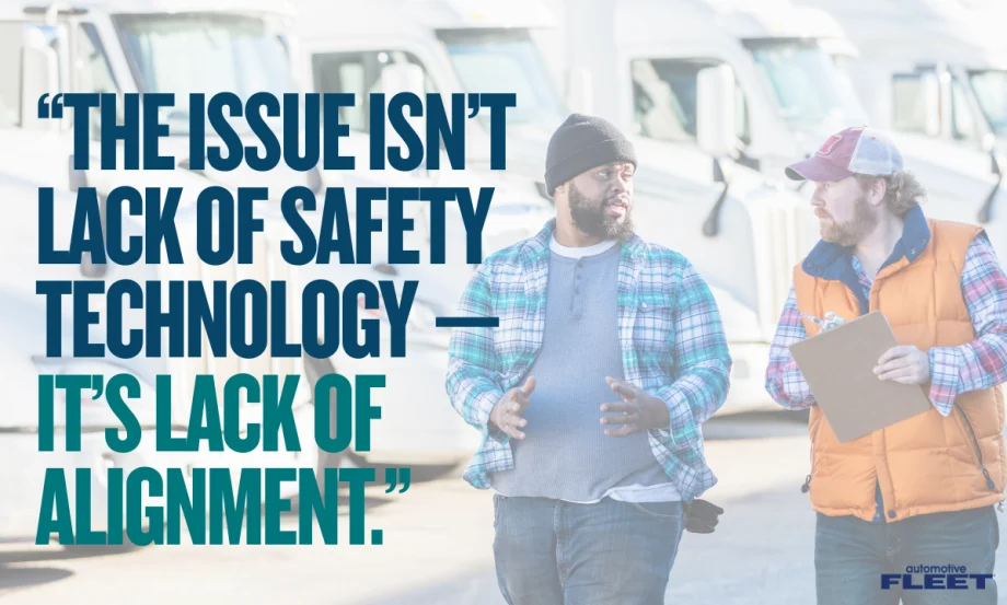 Two trucking industry workers talk in front of semi-trucks beside text reading, “The issue isn’t lack of safety technology — it’s lack of alignment.”