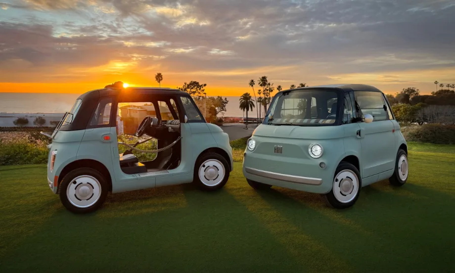 Two Fiat Topolino models shown on a bluff.