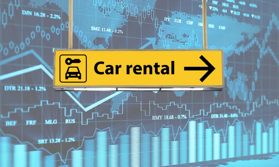 Car rental sign with financial graph in background