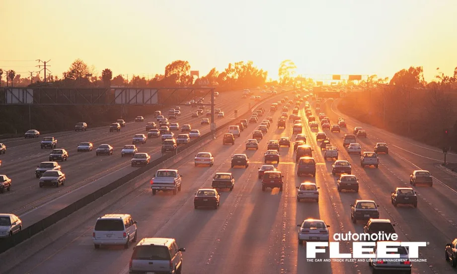 A sunset photo of one-way traffic on the highway with the Automotive Fleet logo at the bottom right.